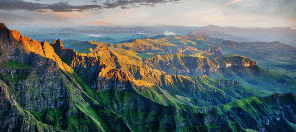 Drakensberg mountain landscape with hiking trails and festive holiday visitors in 2025.