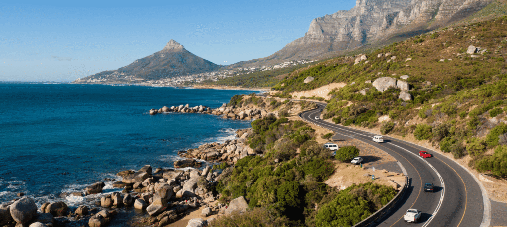 Garden Route coastal view with lagoon, beaches, and festive travellers in 2025.